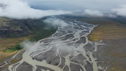 Aerial view of glacial river and mountains, Iceland.