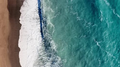 Vertical Atlantic Ocean and Waves Crash on the Coast