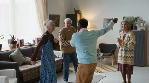 Enthusiastic Seniors Dancing and Enjoying Social Time