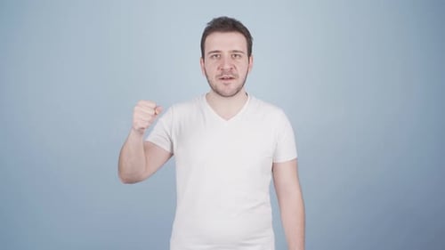 Man getting angry at camera.
