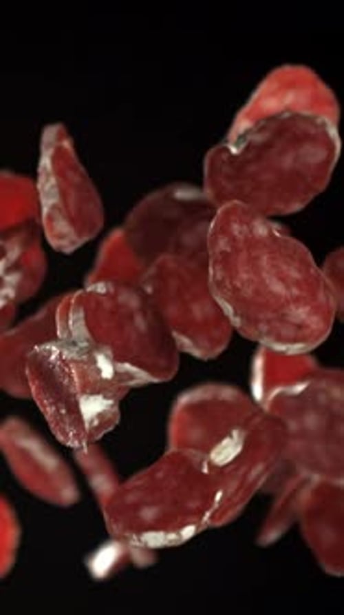 Sliced Salami Flies Up and Down Filmed on a Highspeed Camera at 1000 Fps