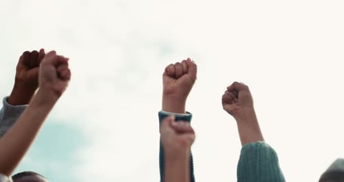 Uprising: Fists Raised Together in Protest
