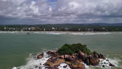 Ramya Rock holiday touristic landmark South Sri Lanka Weligama Bay, aerial drone