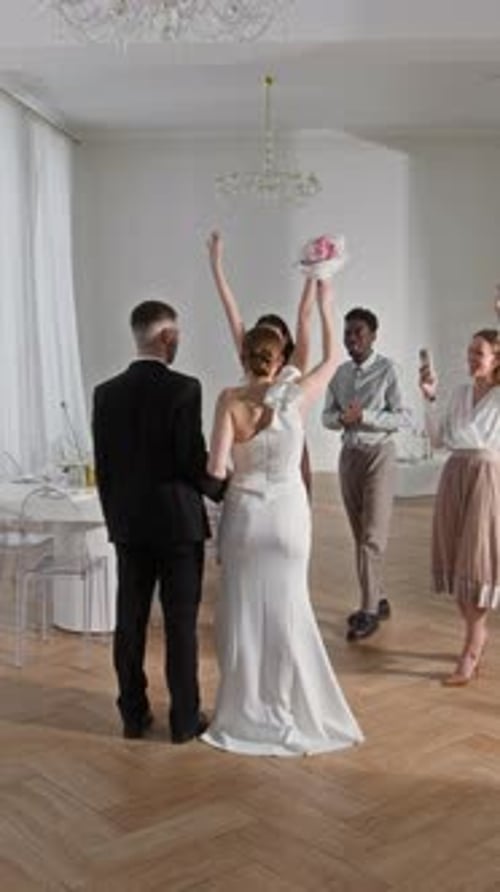 Wedding Couple Joins Friends for Group Hug