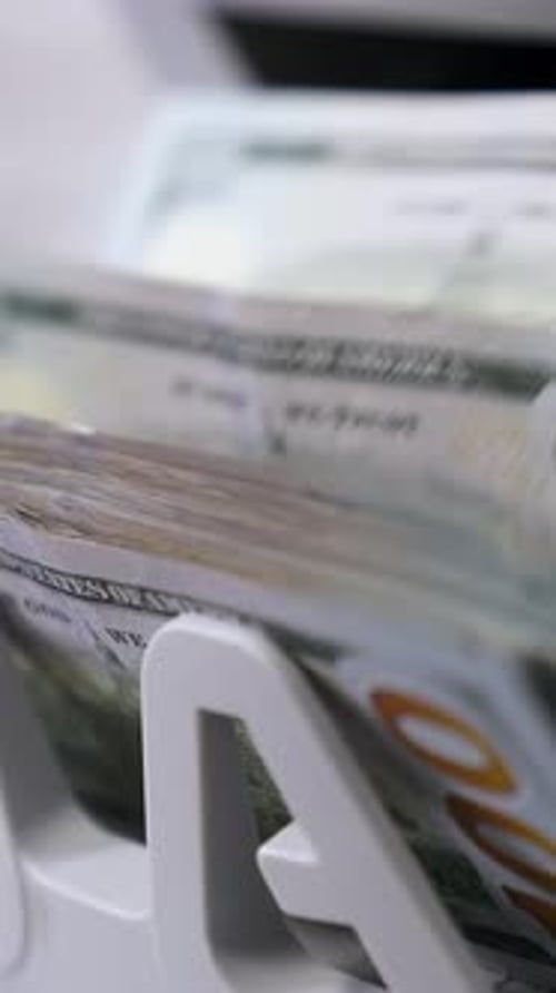 Automatic calculation of paper money.