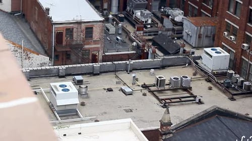 rooftop of a urban building showing HVAC