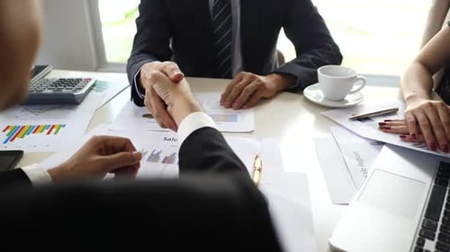 Successful business partnership sealed with a handshake Corporate meeting and agreement