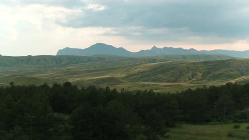 Beautiful Mountain Landscape with Green Hills and Rocks on Horizon Shot Top View of Green Trees on