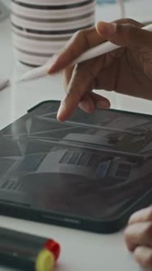 Designer Editing Scheme of Green Plant on Tablet PC with Pencil