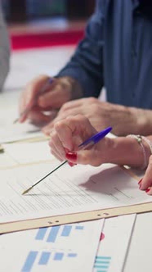 Vertical Video Mature Person Signing a Contract with Insurance Agency Banker