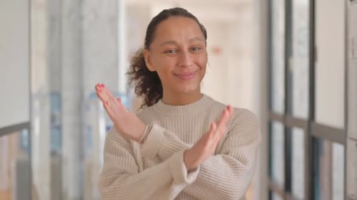 Young Adult Woman Gesturing Denial