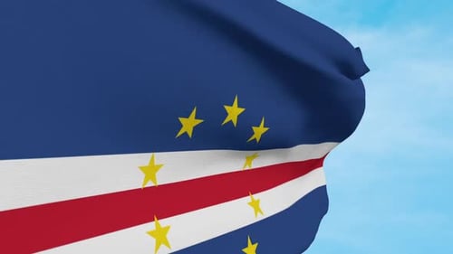 Waving Flag of Cape Verde Against Blue Sky