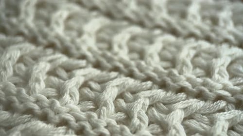 Close Up of Intricate White Knitted Weave