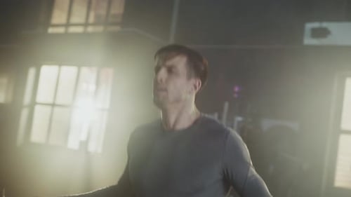 Man Jumps Rope in Indoor Gym