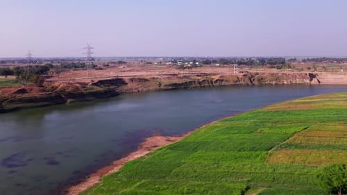 Crop fields lands with Narmada River and current pole at Jotpur, Jabalpur, madhya pradesh, india. da