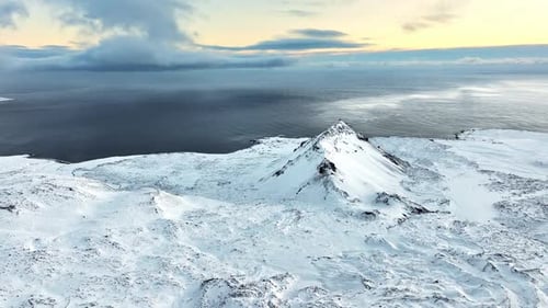 Snowy Mountain Range Aerial View Nature Landscape in Iceland Snow Covered Sharp Mountain Peaks