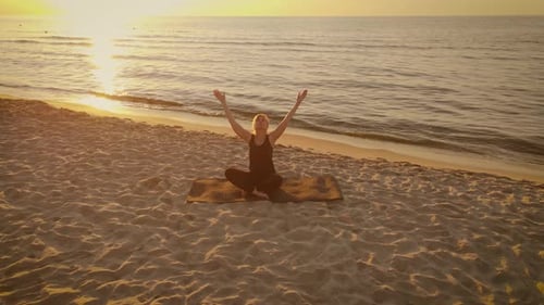 Adult Woman Sitting in Meditation Pose on Indian Beach Lotus Position Medicine Yoga Asana Balance