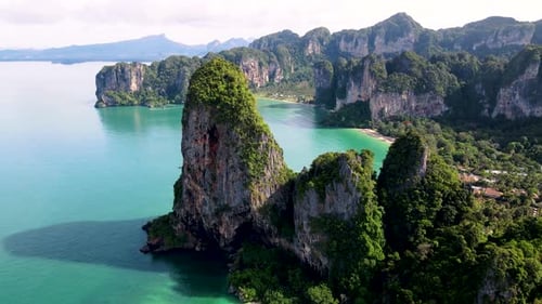 Majestic Limestone Cliffs and Turquoise Waters of Railay Beach in Krabi Thailand