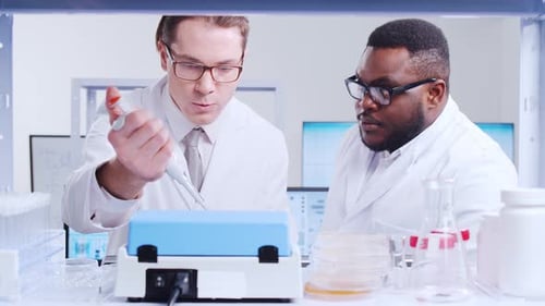 Scientists Conducting Medical Research in Modern Laboratory