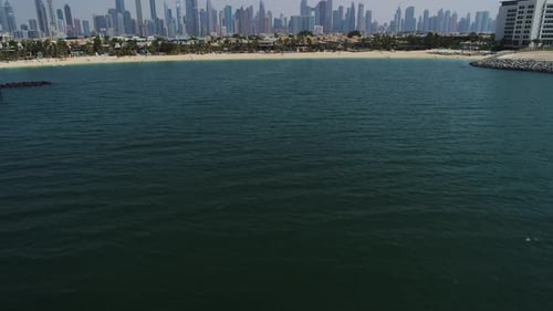 Aerial view of beach and skyscrapers, Dubai, United Arab Emirates.