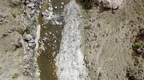 Aerial Narrow Wide Valley With Small Stream Topdown