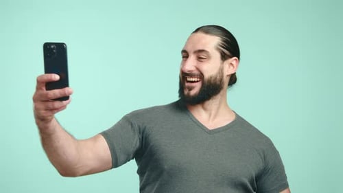 Young Man Posing with Phone