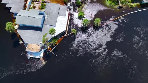Heavy Flood with High Water Surrounding Residential Houses After Hurricane Ian Rainfall in Florida