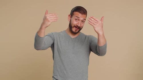 Man Showing Inviting Gesture with Hands Ask to Join Beckoning to Coming Gesturing Hello Goodbye