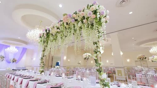 Restaurant Filled with White Tables and Chairs and Candles on Them Wedding Event