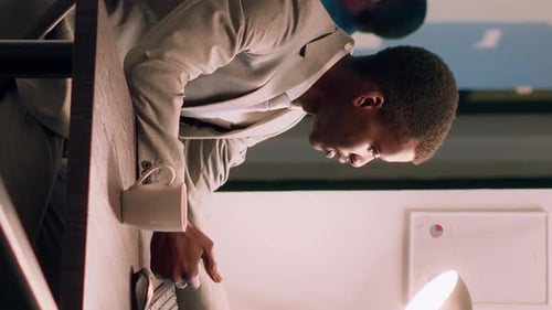 Vertical Video Manager Doing Training Video in Office