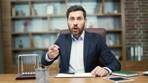 Webcam view of irritated arguing angry mature business man investor looking at the camera and yellin