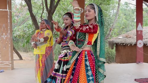 Women Perform Traditional Dance in Colorful Clothing