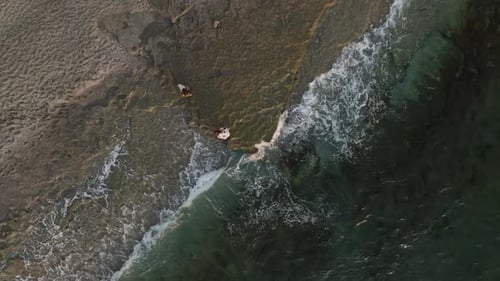 Aerial View A Mesmerizing Sunset Reflects on the Mediterranean Waters with Dramatic Clouds Creating
