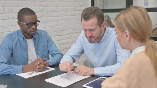 Angry Man Discussing Business Report in Office, Argument