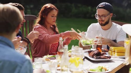 Friends enjoy outdoor dining and sunshine together