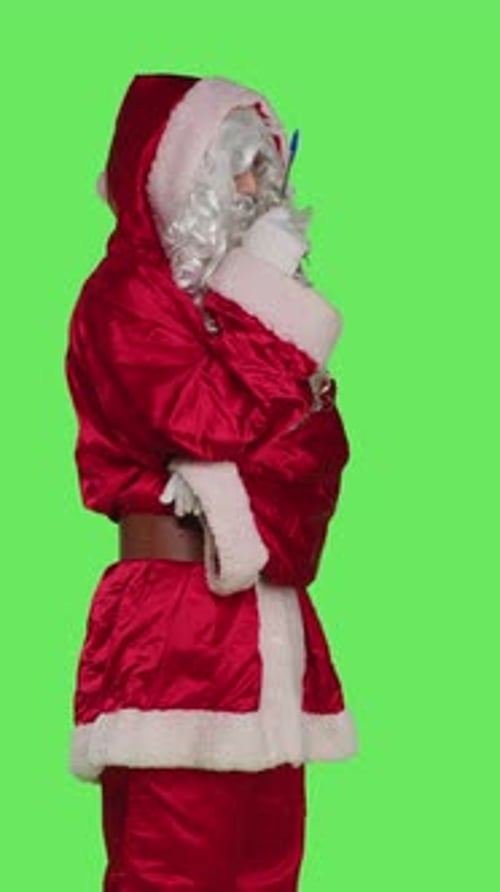 Vertical Video Side View of Thoughtful Man in Santa Claus Suit Thinking
