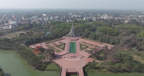 Aerial view of National Memorial surrounded by greenery, Bangladesh.