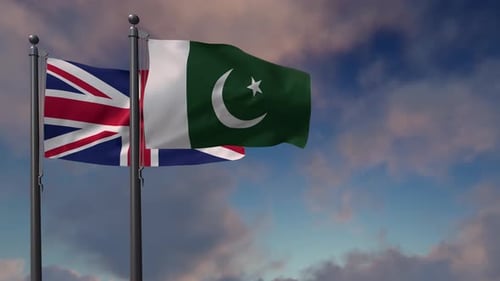 United Kingdom and Pakistan Flags Waving Together