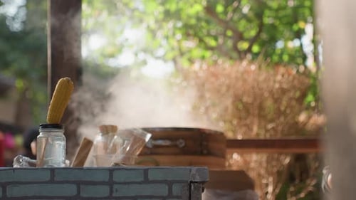 Vibrant Market Scene with Steaming Corn and Rustic Setting Captured Warm Morning at Street Stall