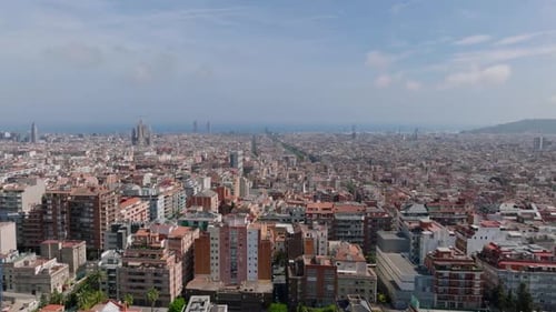 Aerial Footage of Residential Buildings in Urban Borough Famous Construction of Sagrada Familia in
