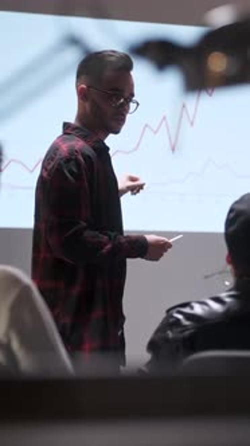 Business Meeting Office Team Analyzes Business Growth Young Man Interested In Audience On Screen