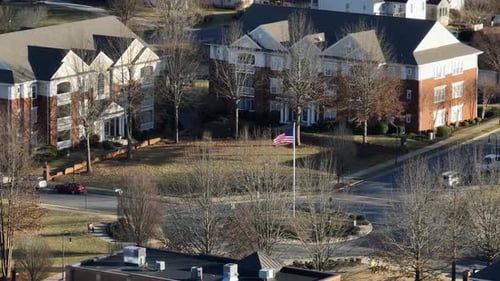 Aerial View of Suburban Neighborhood with American Flag