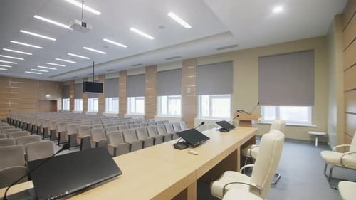 Monitors with Mics on Table and Tribune in Conference Hall