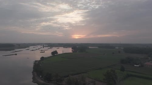 Aerial View Of River At Sunset