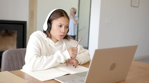 Woman in a Home Having an Online Conference