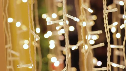 Glowing Christmas Lights Hanging Indoors
