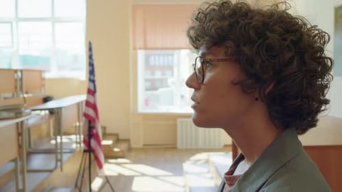 Female College Teacher Explaining Subject