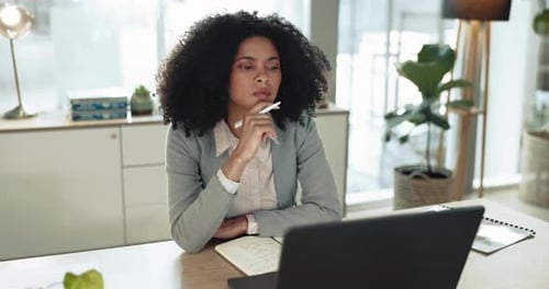 Business, woman and thinking of ideas at laptop in office for problem solving