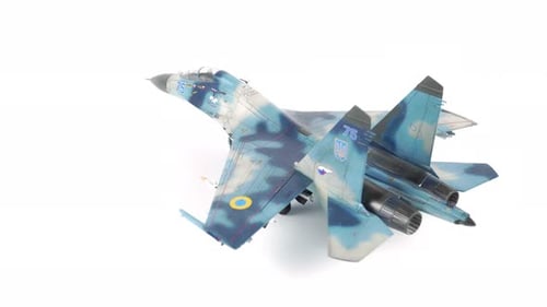 Assembly Model Of Su 27 Fighter Airplane On White Background.