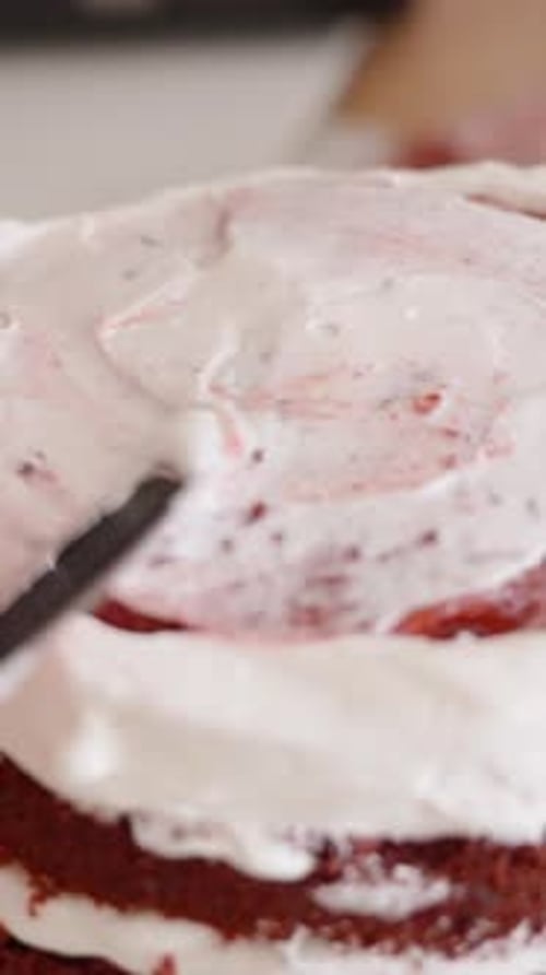 Icing Delicious Red Velvet Cake With White Frosting